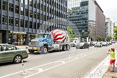Concrete mixer truck painted by stars and stripes Editorial Stock Photo