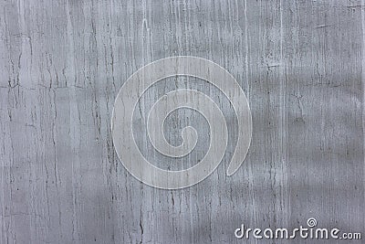 concrete outdoor wall with matte gray paint and white and black smudges - full-frame background and flat texture Stock Photo