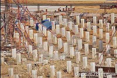 Concrete piles at a construction site Stock Photo