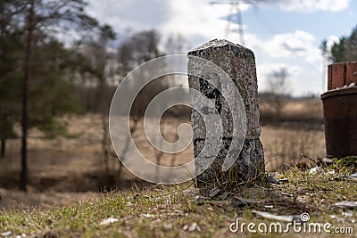 Concrete pole with black number 9 on a pole Stock Photo