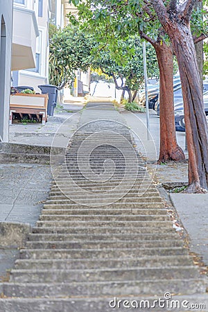 Concrete small steps on a sloped side walk in San Francisco, California Stock Photo