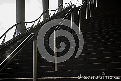 Concrete staircase with metal handrails Stock Photo