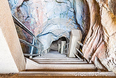 Concrete Stairway into Beautiful Cave Stock Photo