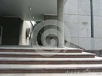 Concrete steps in front of the office center entrance. Gray urban grunge background for your design. Stock Photo