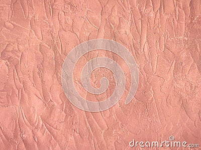 Concrete texture painted in trendy rose gold colour. Cement stucco wall background Stock Photo