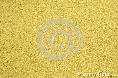 The concrete wall is yellow. Stock Photo