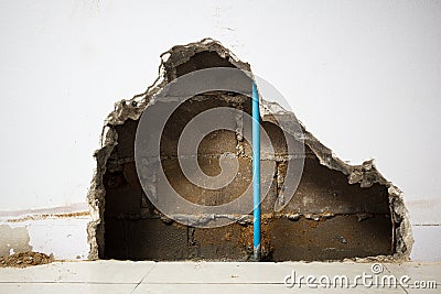 Concrete walls in the shade that have been smashed Stock Photo