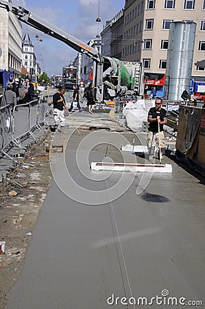 CONCTRETE WORKERS Editorial Stock Photo