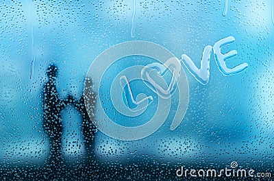 Condensation on glass forming a love word Stock Photo