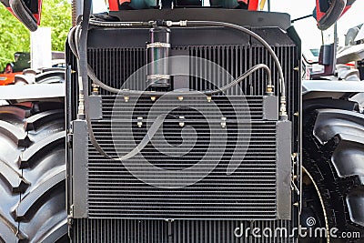 Condenser cooler element on car. Close up cropped photo detail of aluminum automotive grill radiator Stock Photo