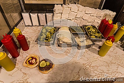 Condiments on counter of burger restaurant Stock Photo