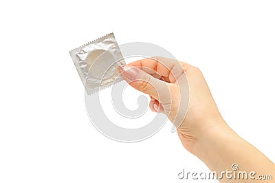 Condom in female hand Stock Photo