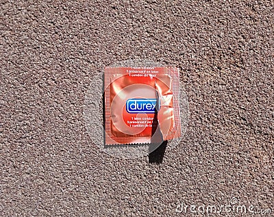 Condom package opened Editorial Stock Photo