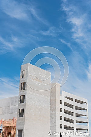 Condominium building construction with multilevel garage and elevator near Dallas, Texas, USA Stock Photo