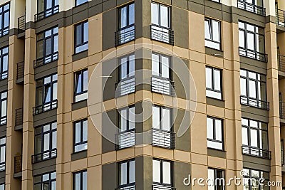 Condominium or modern apartment building with symmetrical architecture in the city downtown. Real estate development and urban gro Stock Photo