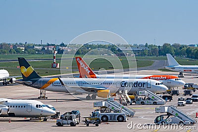 Condor and Easyjet airplanes at Berlin Tegel airport Editorial Stock Photo