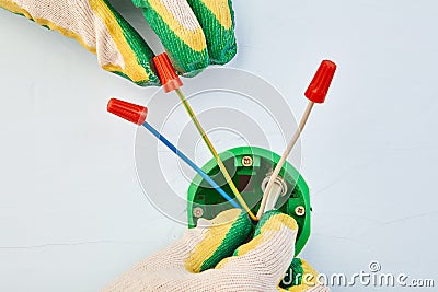 Conductors on wires of round electrical box Stock Photo