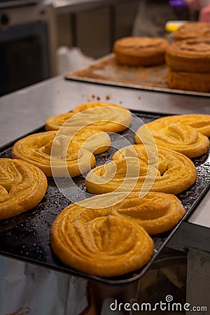 Confectioner works the puff pastry dough, artisan, gourmet, freshly baked Stock Photo