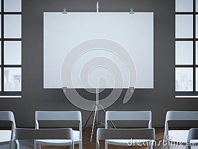 Conference room with blank screen and rows of chairs. Stock Photo