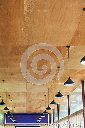 A conference room with wooden ceiling and chandelier Stock Photo