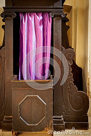 Confessional booth in the Cathedral of Bevagna Italy. Stock Photo