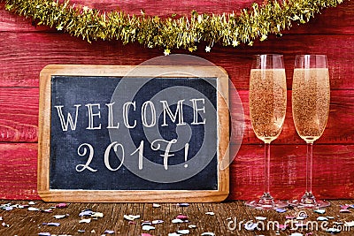 Confetti, champagne and text welcome 2017 Stock Photo