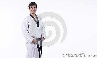 Confidence athlete strong young man wear uniform taekwondo holding black belt in own hand while standing over isolated white Stock Photo