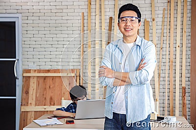 Father stand and cross his arm. Stock Photo