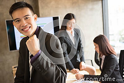 Confident Asian office worker Stock Photo