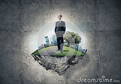 Confident boss and modern city as concept of eco green construct Stock Photo