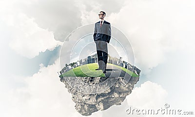 Confident boss and modern city as concept of eco green construct Stock Photo