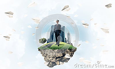 Confident boss and modern city as concept of eco green construct Stock Photo