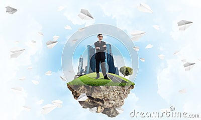 Confident boss and modern city as concept of eco green construction Stock Photo
