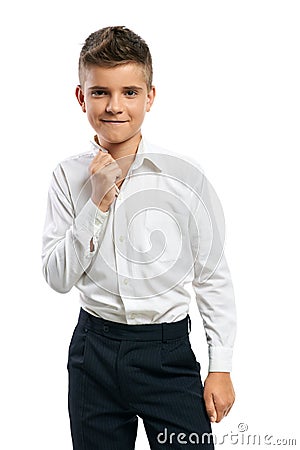 Confident boy straightens collar Stock Photo