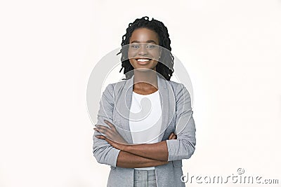 Confident Business Girl Smiling At Camera Crossing Hands, White Background Stock Photo