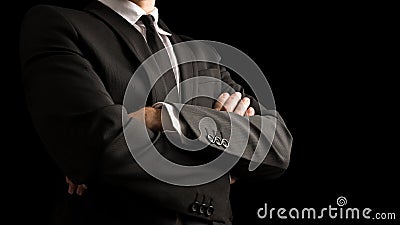 Confident Businessman Crossing Arms on Front Stock Photo