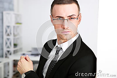 Confident businessman in glasses at office Stock Photo