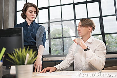 Businessman hard working with business team in office Stock Photo