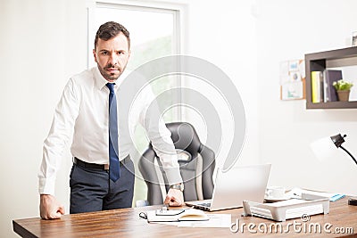 Confident businessman in his office Stock Photo