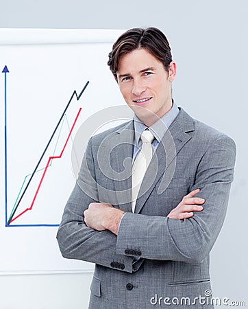 Confident businessman reporting sales figures Stock Photo