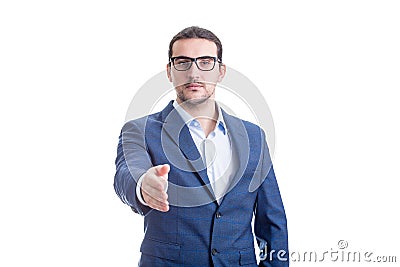 Confident businessman stretching hand for handshake greeting isolated on white background. Corporate person salute, boss hello Stock Photo