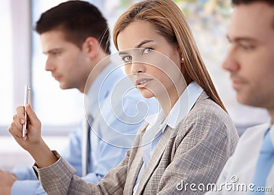 Confident businesswoman at business meeting Stock Photo