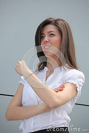 Confident businesswoman raising her fist Stock Photo