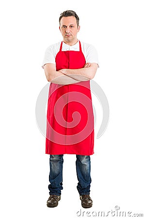 Confident butcher or supermarket worker Stock Photo