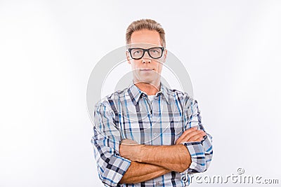 Confident calm aged man in glasses crossing hands Stock Photo