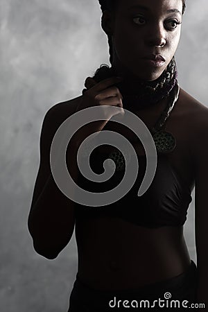 Confident calm black woman with long braids Stock Photo
