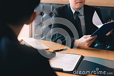 Confident caucasian manager interviews talking with a client prospective male employee Stock Photo