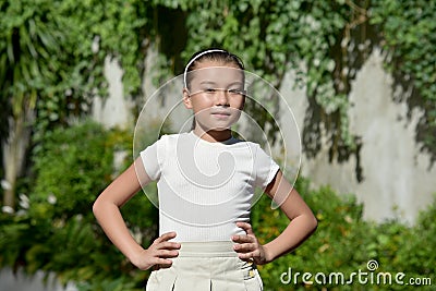 A Confident Cute Philippina Person Outside Stock Photo