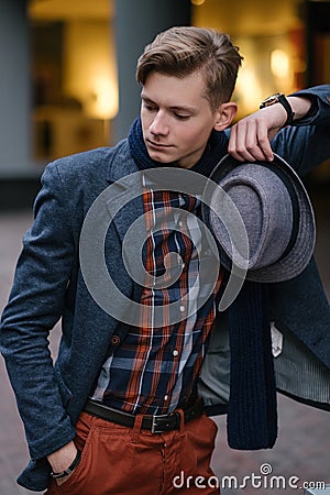 Confident dandy smug young man fashion image Stock Photo