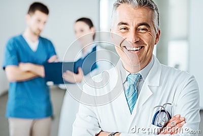 Confident doctor at hospital posing Stock Photo